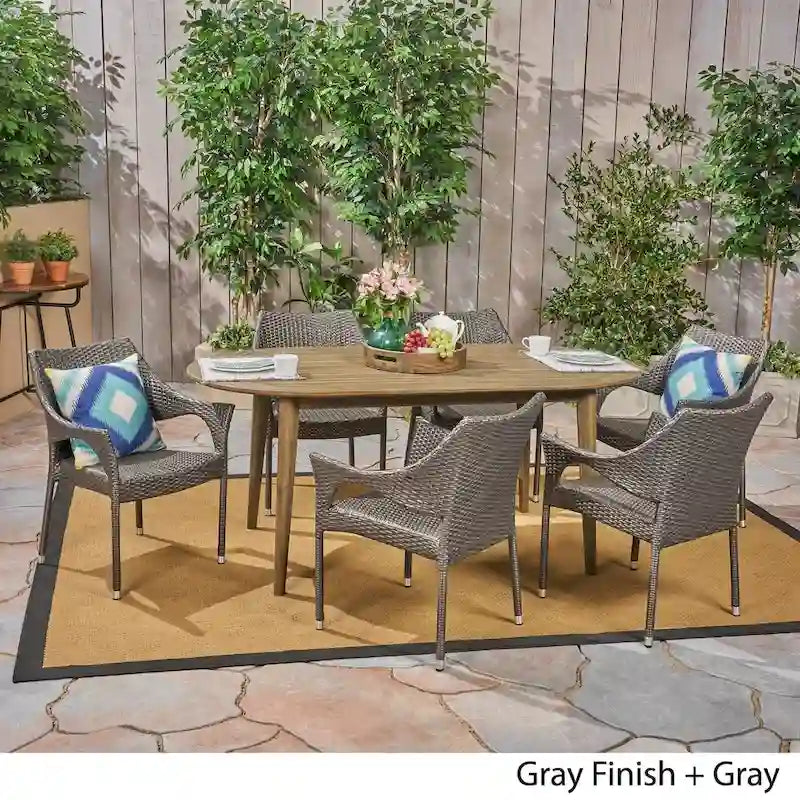Fayette Outdoor 7 Piece Acacia Wood Dining Set with Stacking Wicker Chairs by Christopher Knight Home