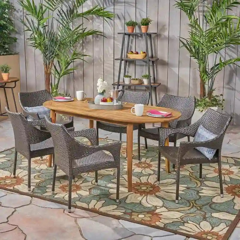 Fayette Outdoor 7 Piece Acacia Wood Dining Set with Stacking Wicker Chairs by Christopher Knight Home