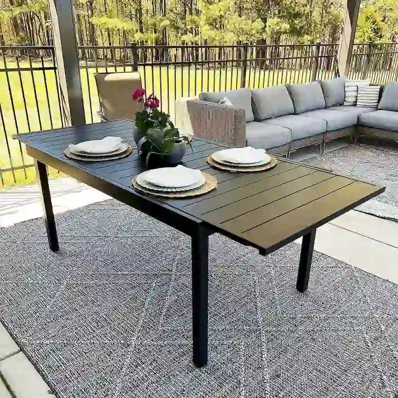 9-Piece Dining Set, 1 Extendable MetalTable and 8 Spring Motion Textilene Chairs